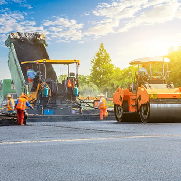 Construction site is laying new asphalt
